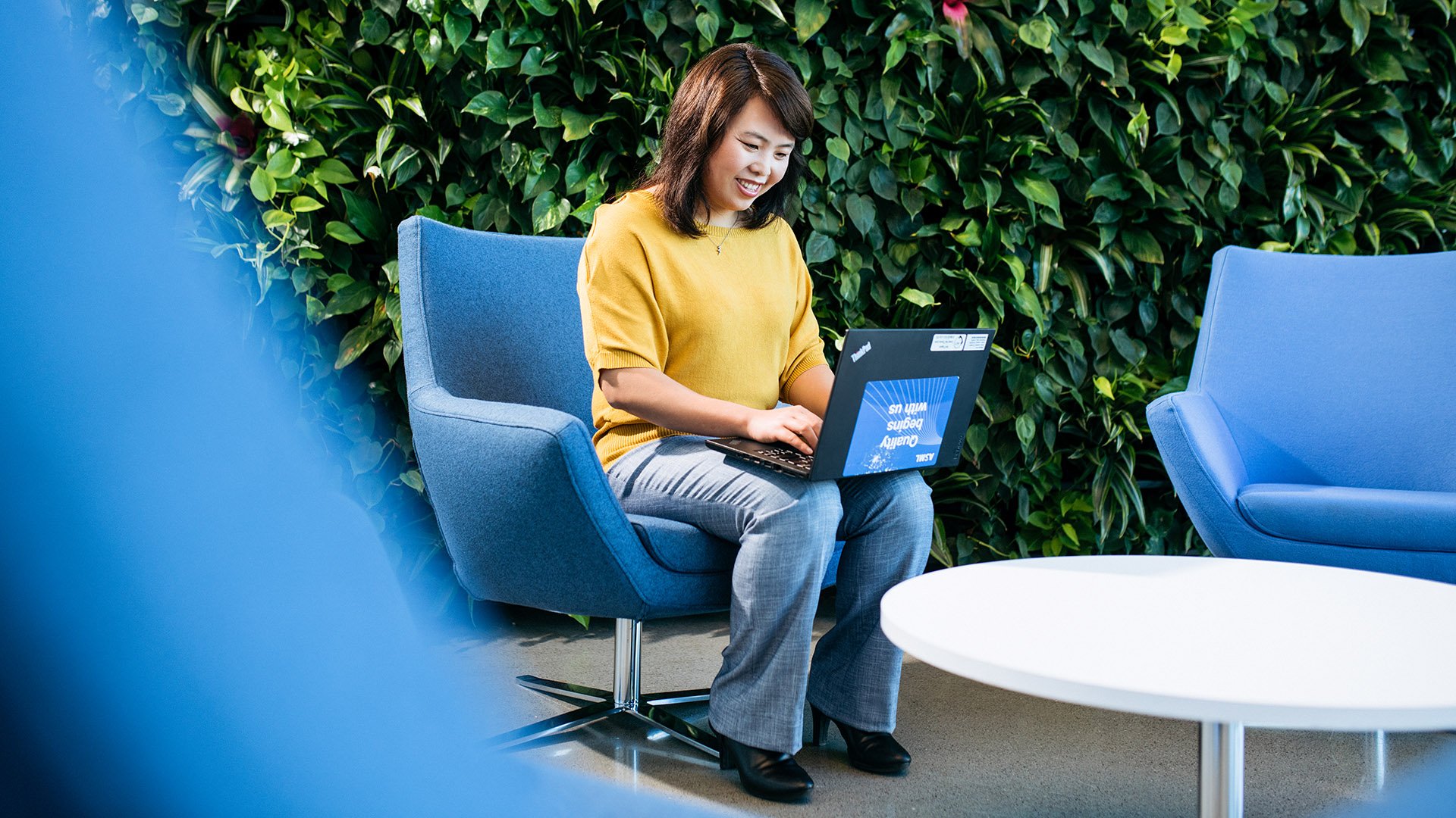 Senior software quality assurance manager Mingjing Zhao at work at ASML in Silicon Valley. Senior software quality assurance manager Mingjing Zhao at work at ASML in Silicon Valley.