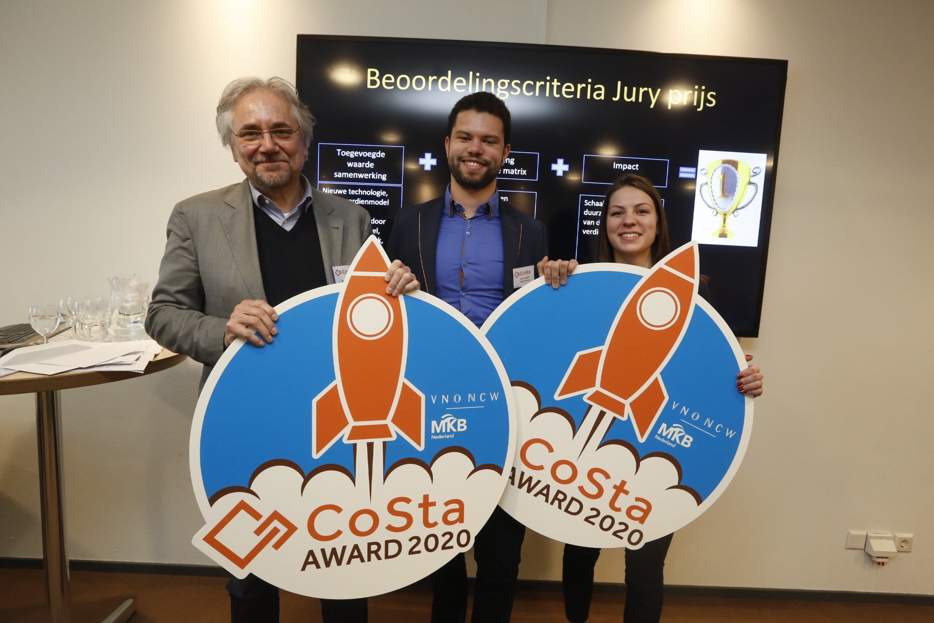 three people holding two signs for CoSta Award 2020 for Incooling three people holding two signs for CoSta Award 2020 for Incooling