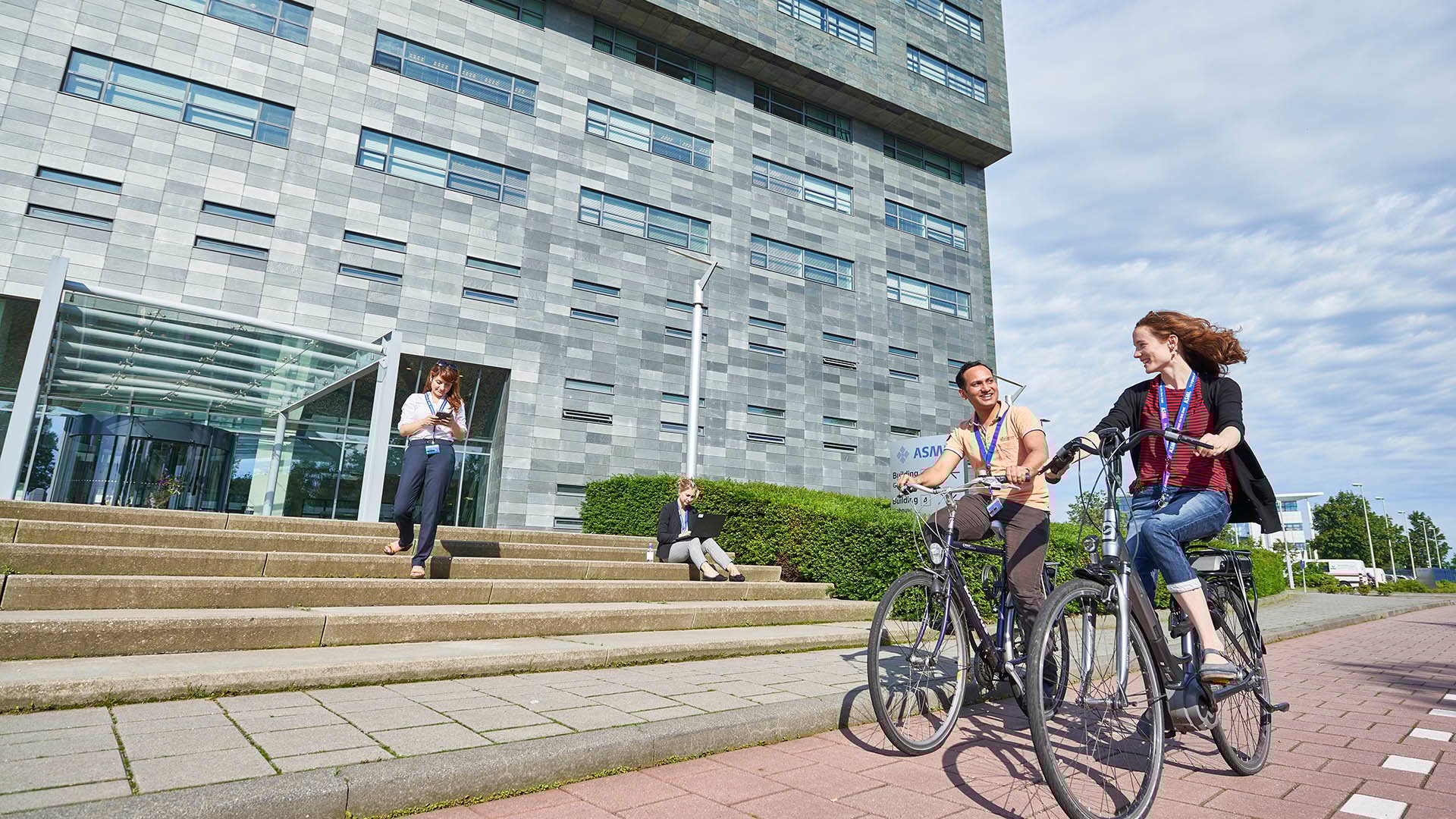 Employees biking together Employees biking together