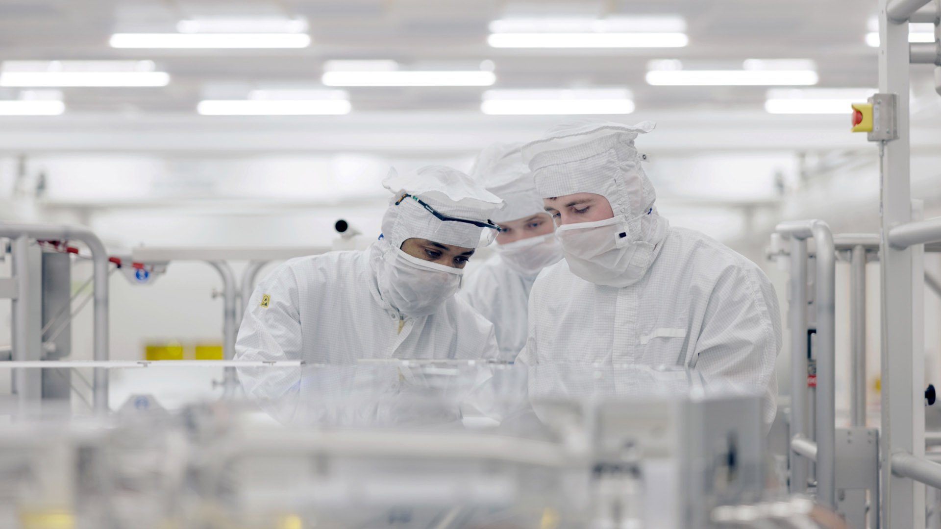 engineer working in clean room engineer working in clean room