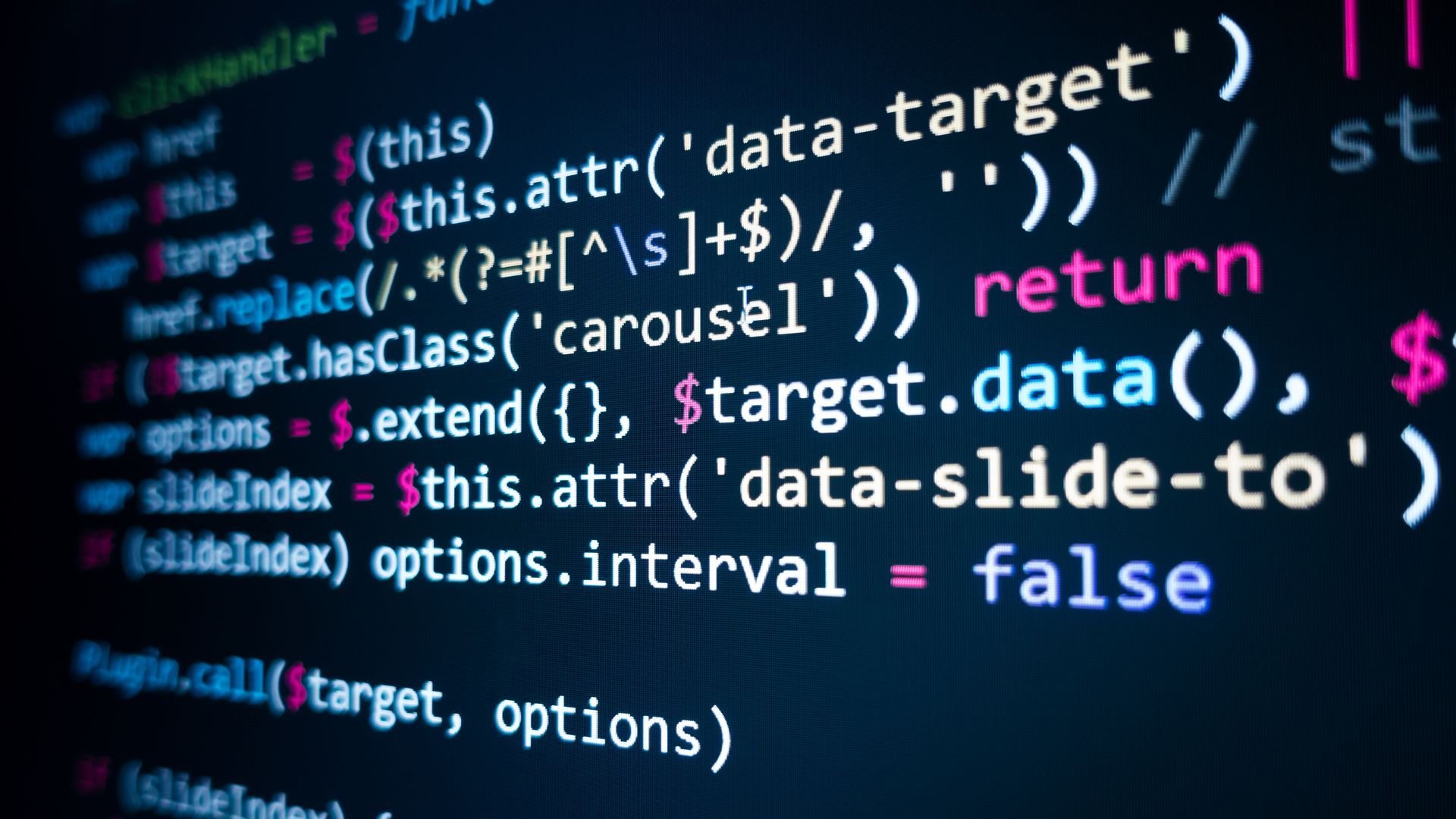 Lines of colored code on a black background. Lines of colored code on a black background.